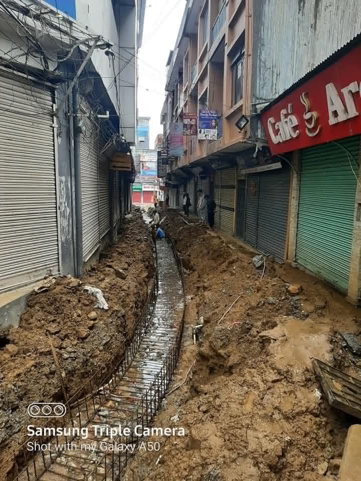 Urban road construction site documented by Kamala Construction Pvt. Ltd.